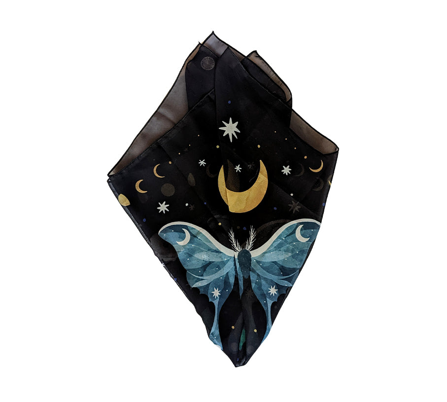 A beautifully designed Midnight Garden Scarf featuring a mystical night theme, made from 100% recycled vegan silk, perfect for various styling options.