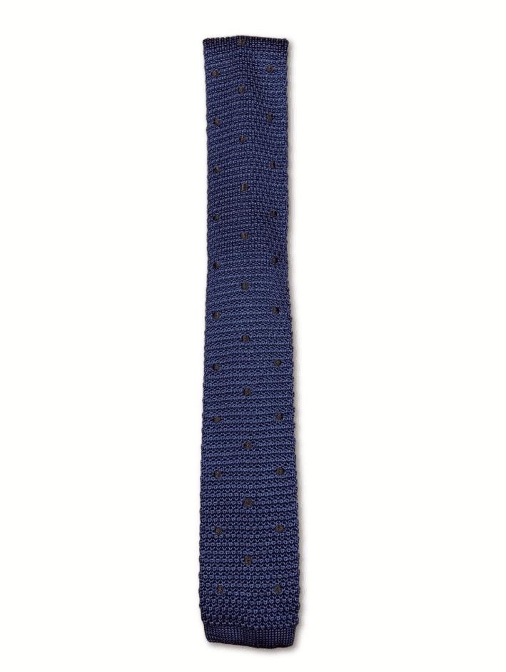 Midnight teal knitted tie with brown polka dots, showcasing a luxurious silk texture and square end design.