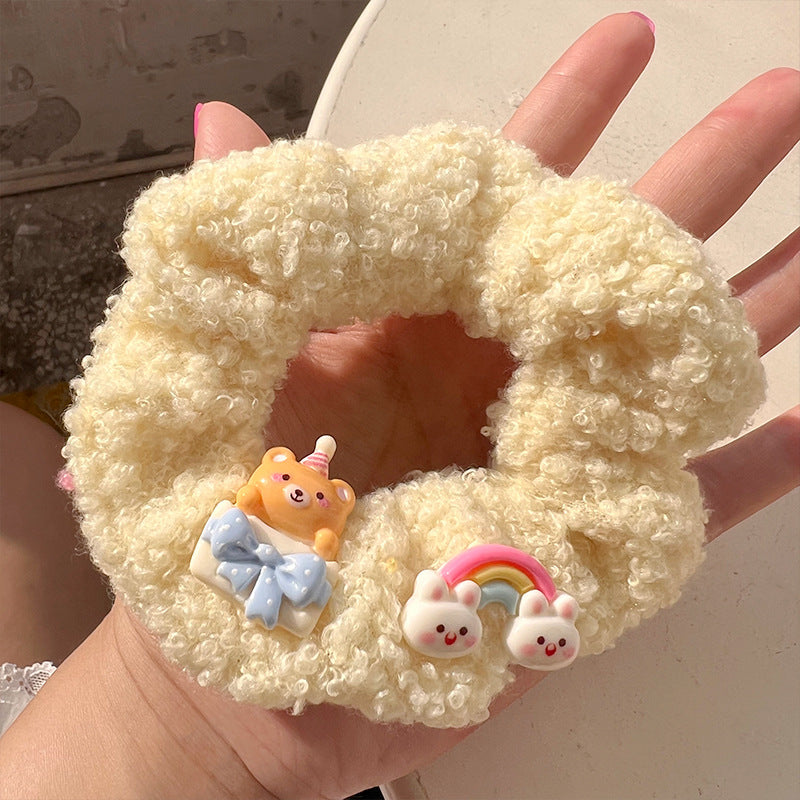 Milk Coffee Color Lamb Plush Hair Tie featuring a cute lamb design, soft and fuzzy material, perfect for stylish hair management.