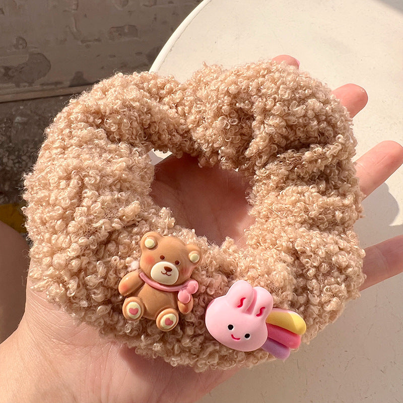 Milk Coffee Color Lamb Plush Hair Tie featuring a cute lamb design, soft and fuzzy material, perfect for stylish hair management.