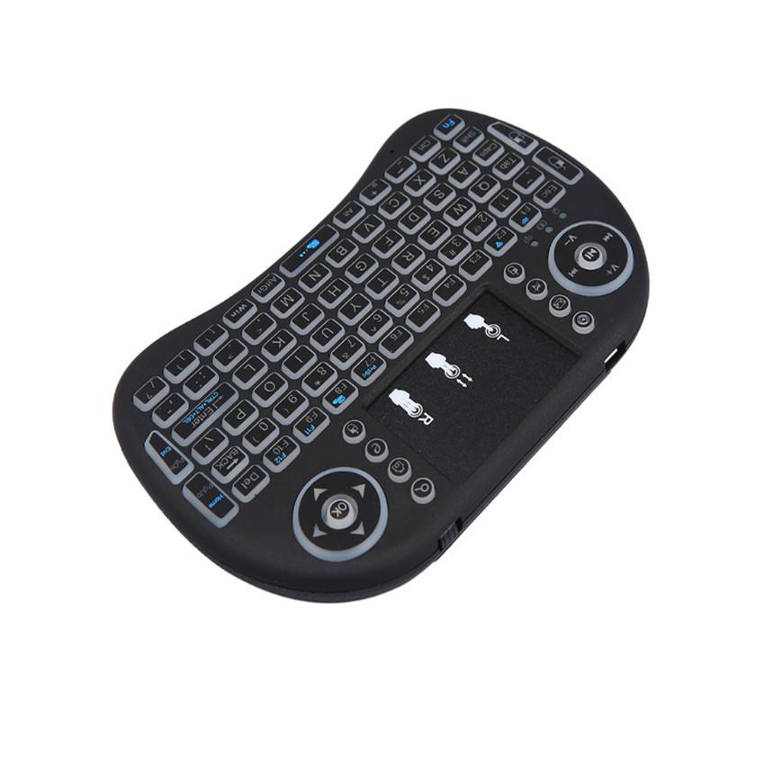 Mini 2.4GHz Wireless Backlit Keyboard with Touchpad, showcasing its compact design and illuminated keys.