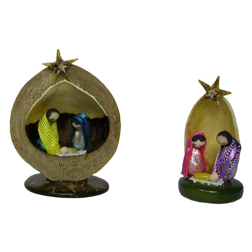 Handmade Miniature Nut Nativities crafted from Macadamia and Pistachio shells, featuring intricate details of Mary, Joseph, and Baby Jesus inside.