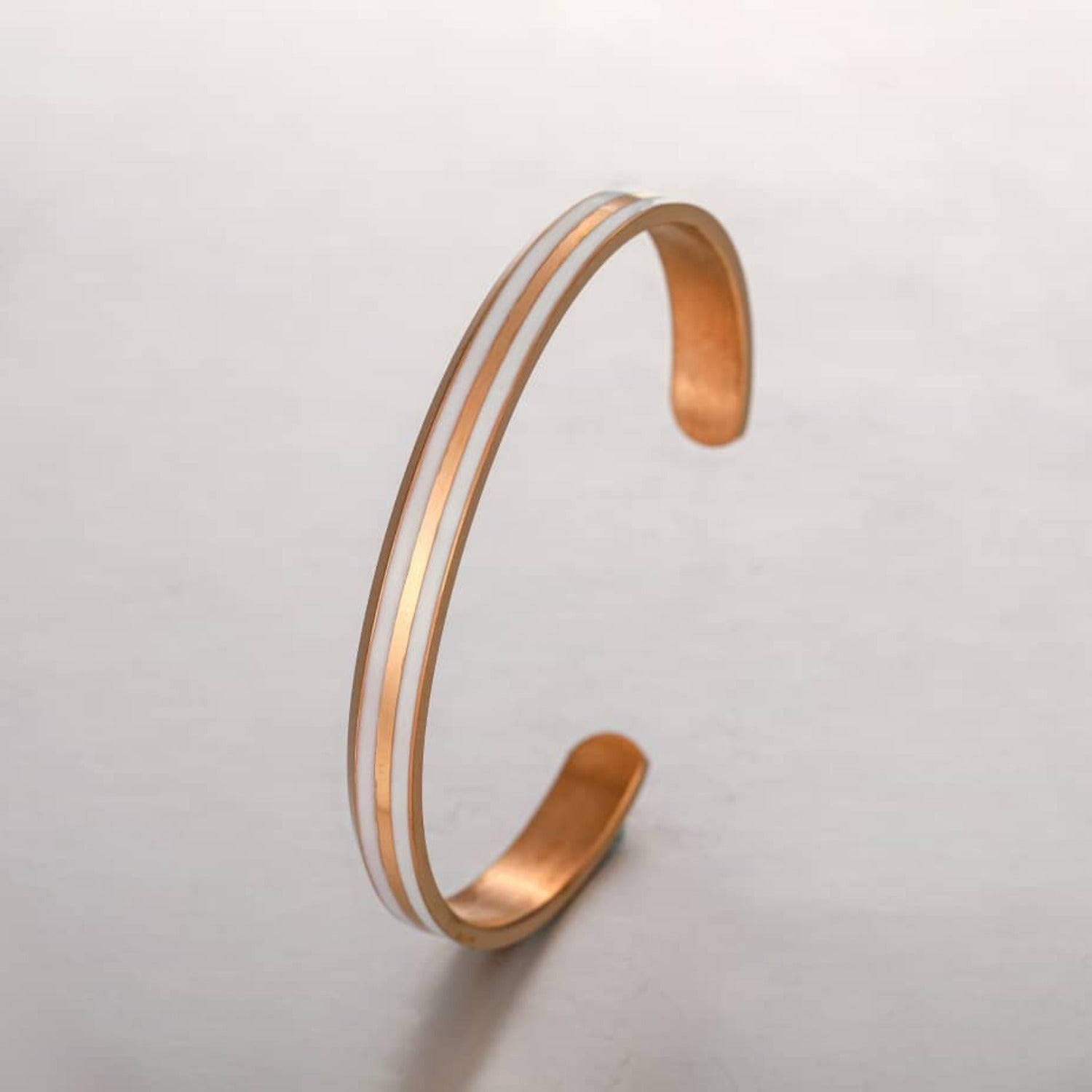 Minimalist Classic Bracelet in Rose Gold and White, showcasing its elegant design and stainless steel craftsmanship.