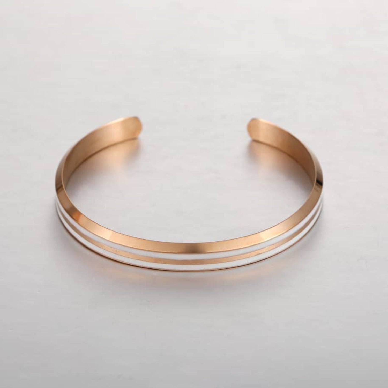 Minimalist Classic Bracelet in Rose Gold and White, showcasing its elegant design and stainless steel craftsmanship.