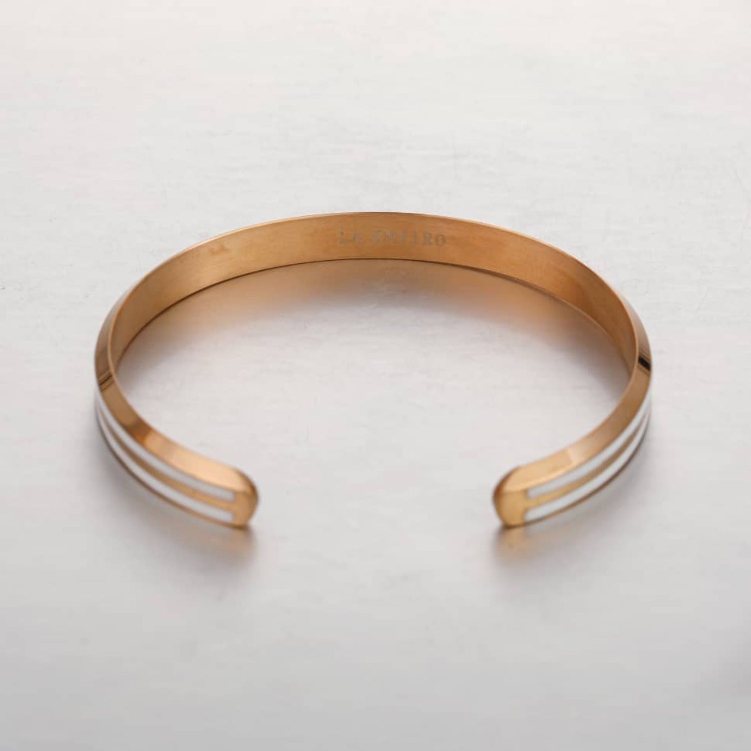 Minimalist Classic Bracelet in Rose Gold and White, showcasing its elegant design and stainless steel craftsmanship.