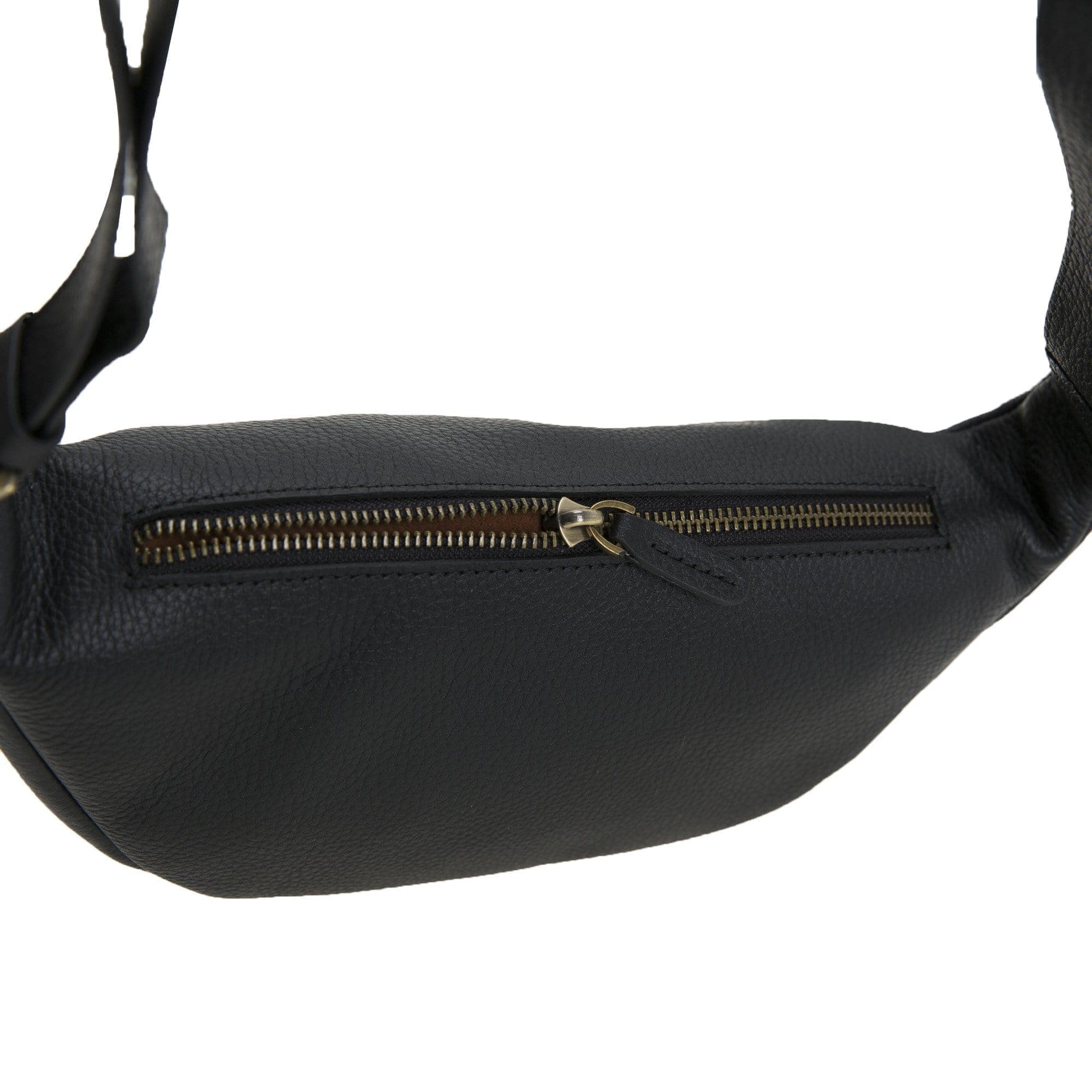 Minoan Genuine Leather Waist Bag showcasing its stylish design and adjustable strap, perfect for both men and women.