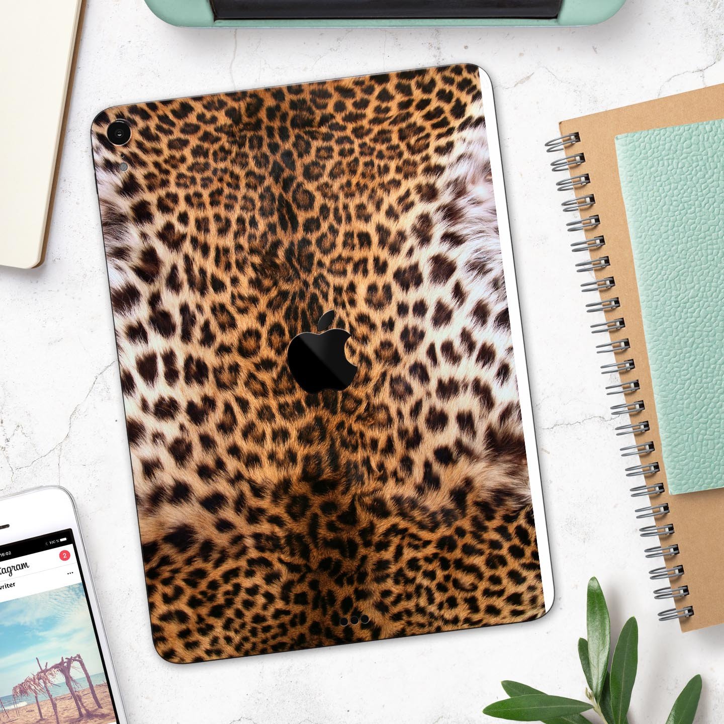 Mirrored Leopard Hide skin decal for Apple iPad Pro, showcasing a stylish leopard print design with a glossy finish.