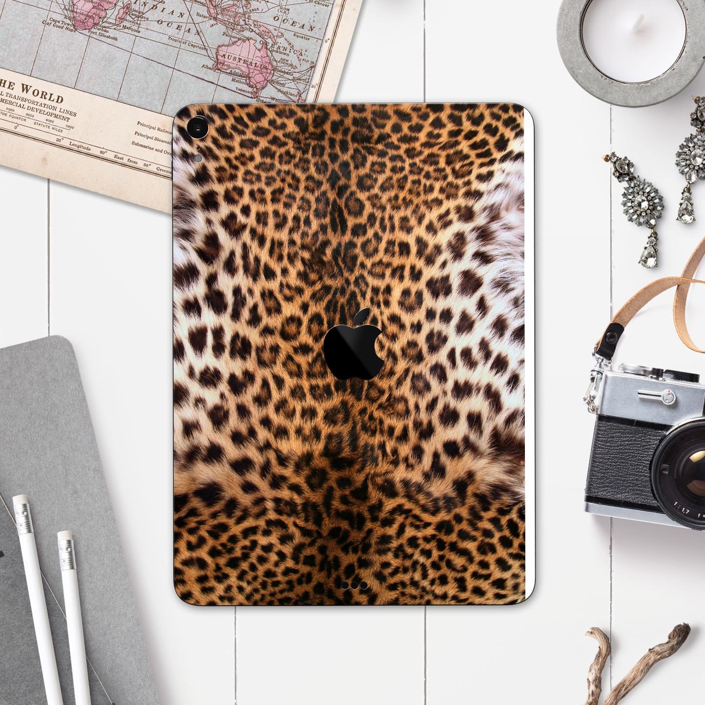 Mirrored Leopard Hide skin decal for Apple iPad Pro, showcasing a stylish leopard print design with a glossy finish.