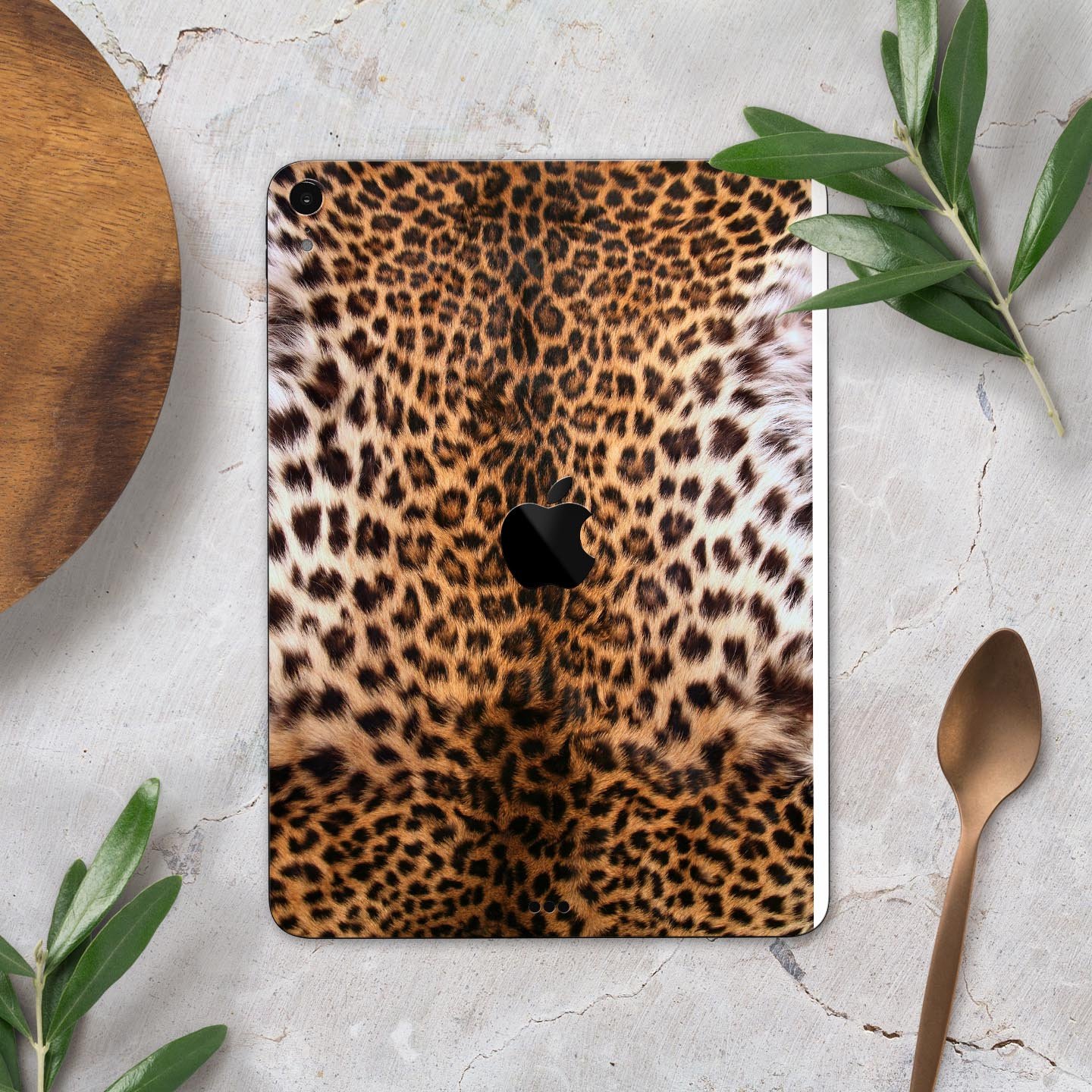 Mirrored Leopard Hide skin decal for Apple iPad Pro, showcasing a stylish leopard print design with a glossy finish.