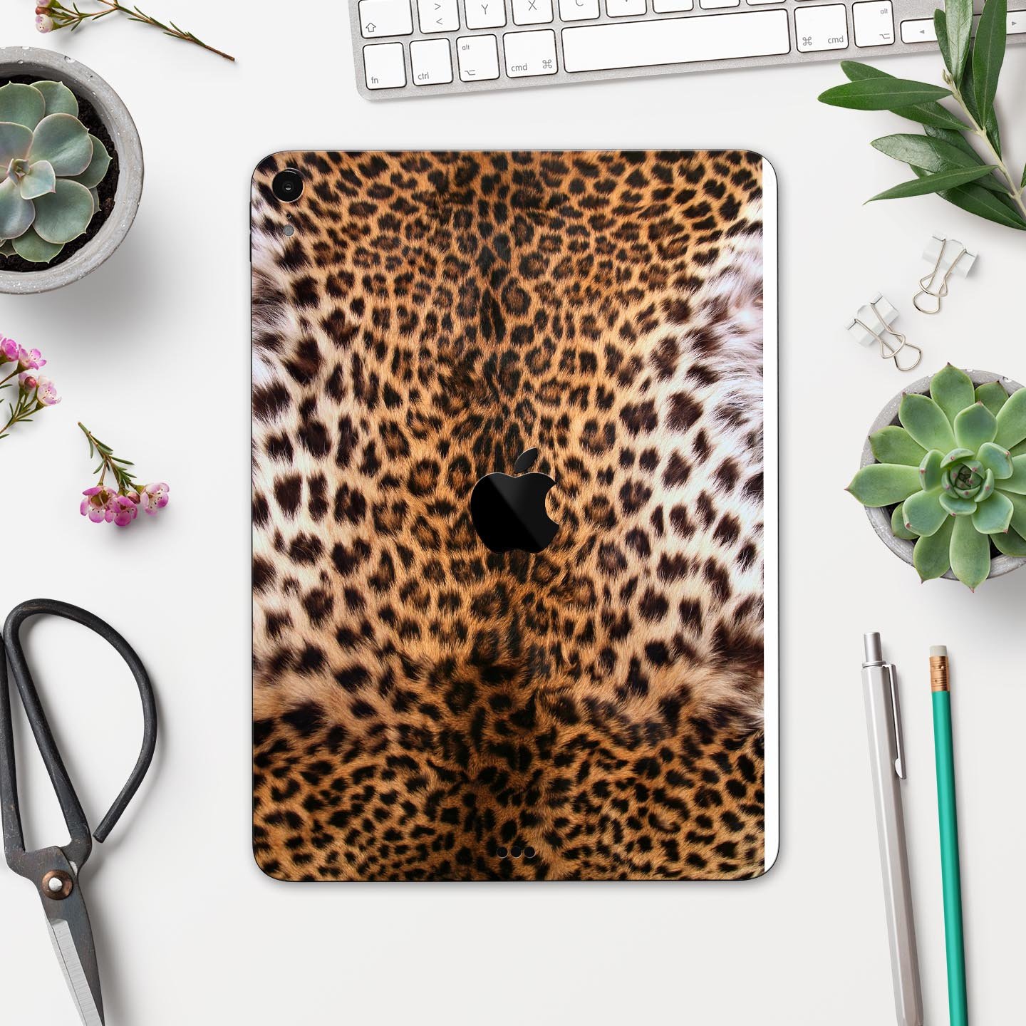 Mirrored Leopard Hide skin decal for Apple iPad Pro, showcasing a stylish leopard print design with a glossy finish.