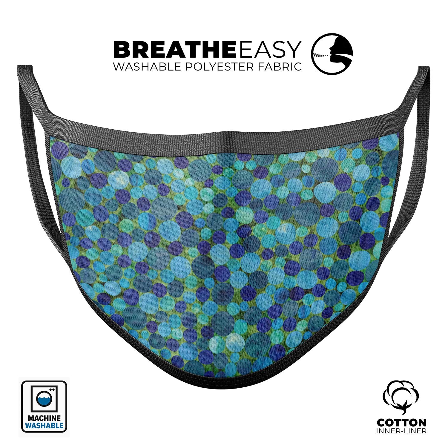 Mixed Blue-Green Watercolor Dots reusable mouth cover, showcasing a vibrant design and adjustable ear-loop bands for a comfortable fit.