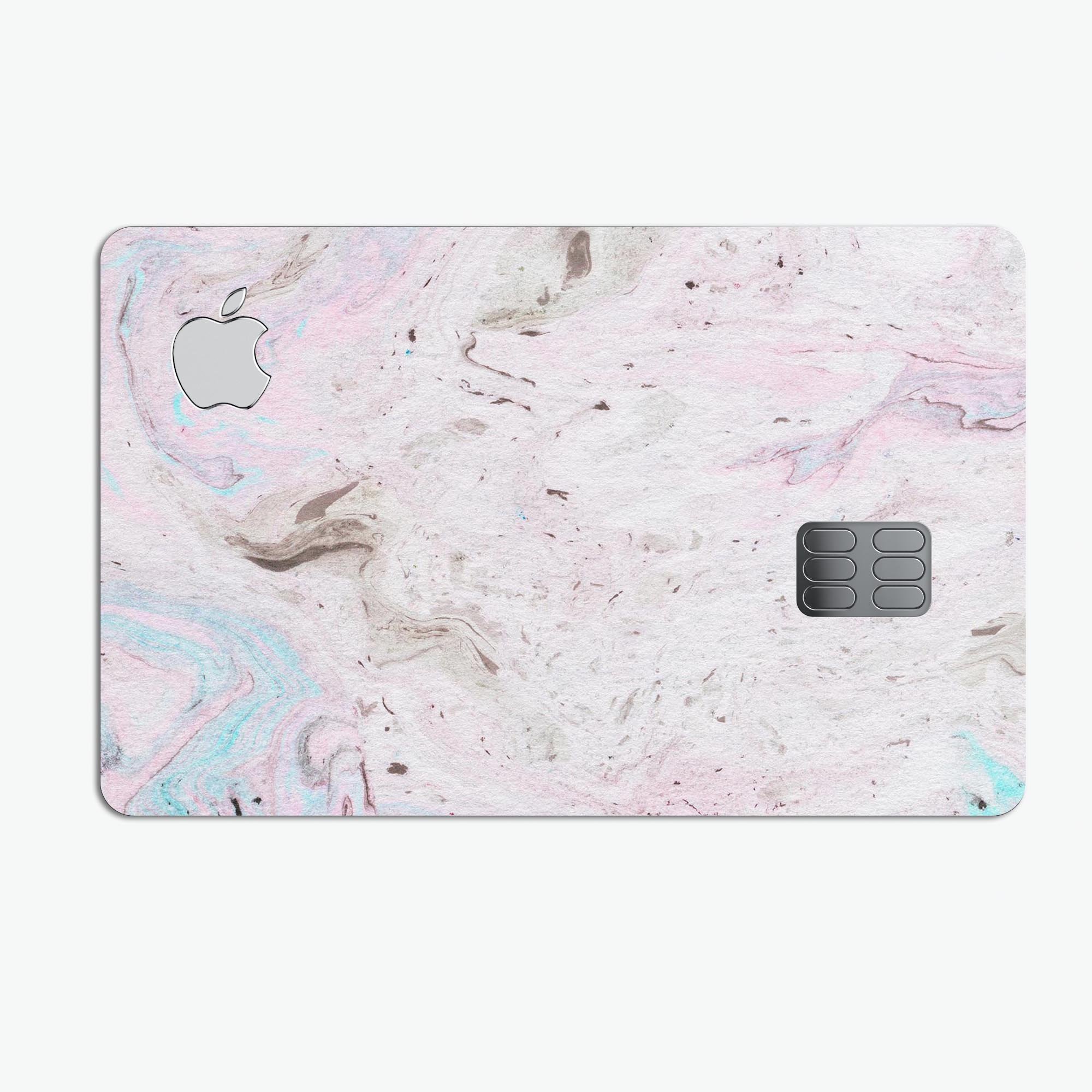 Mixtured Pink and Gray v3 Textured Marble decal applied on an Apple Card, showcasing its stylish design and premium finish.