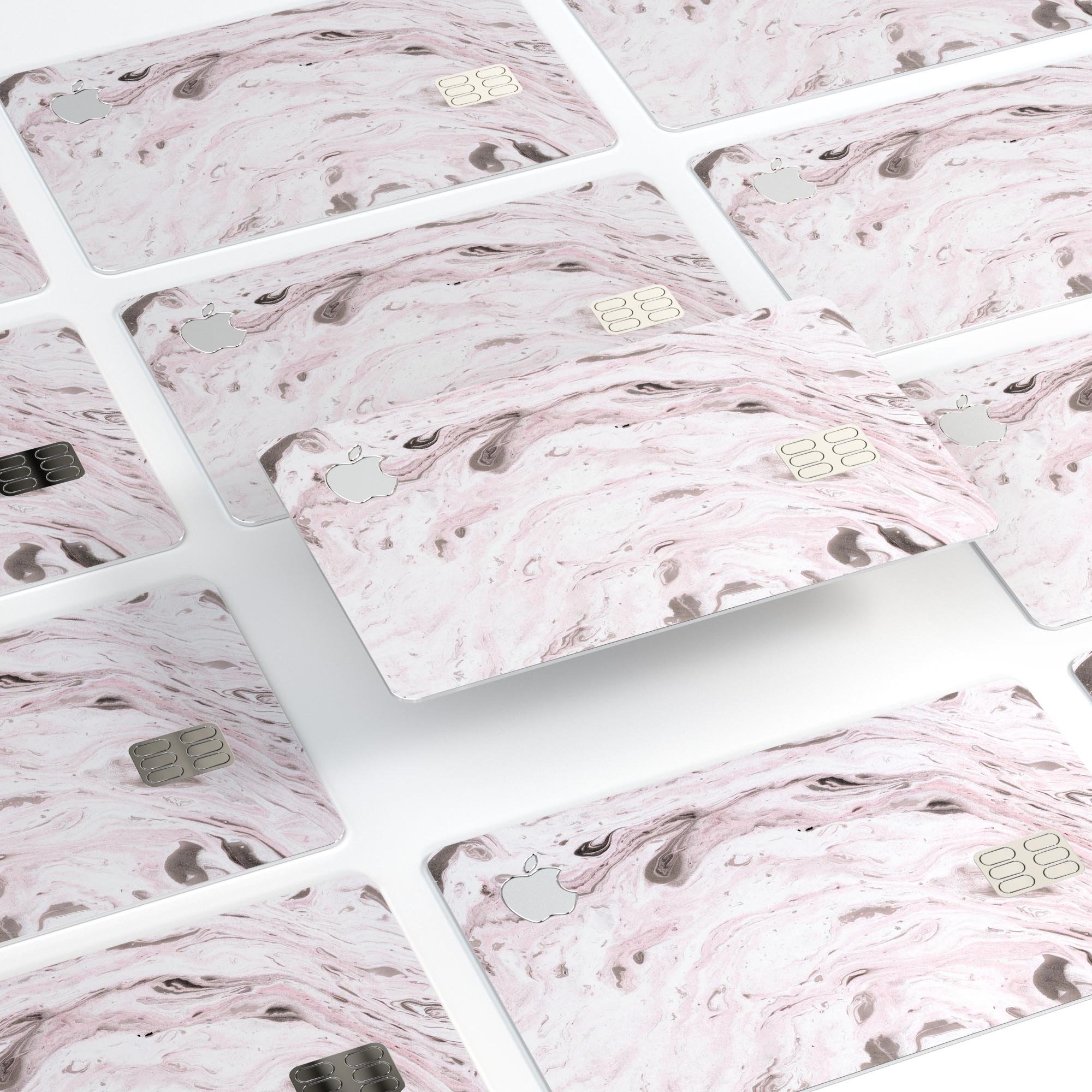 Mixtured Pink and Gray v9 Textured Marble decal applied on an Apple Card, showcasing its stylish design and premium finish.