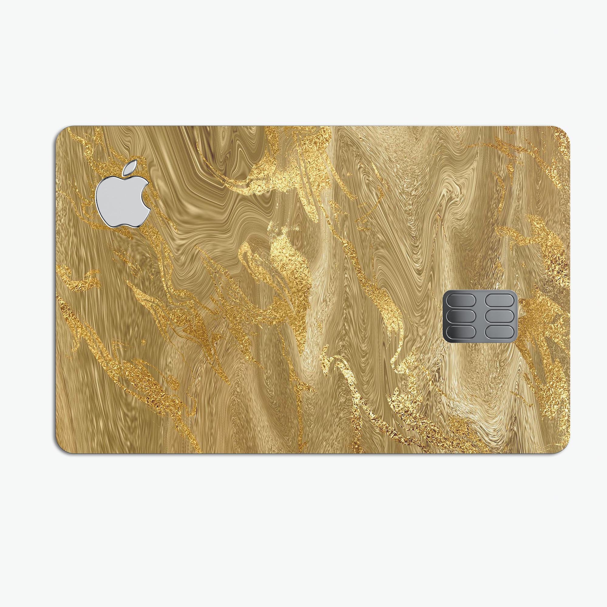 Molten Gold Digital Foil Swirl V4 skin kit for Apple Card, showcasing a premium protective vinyl design with a glossy finish.