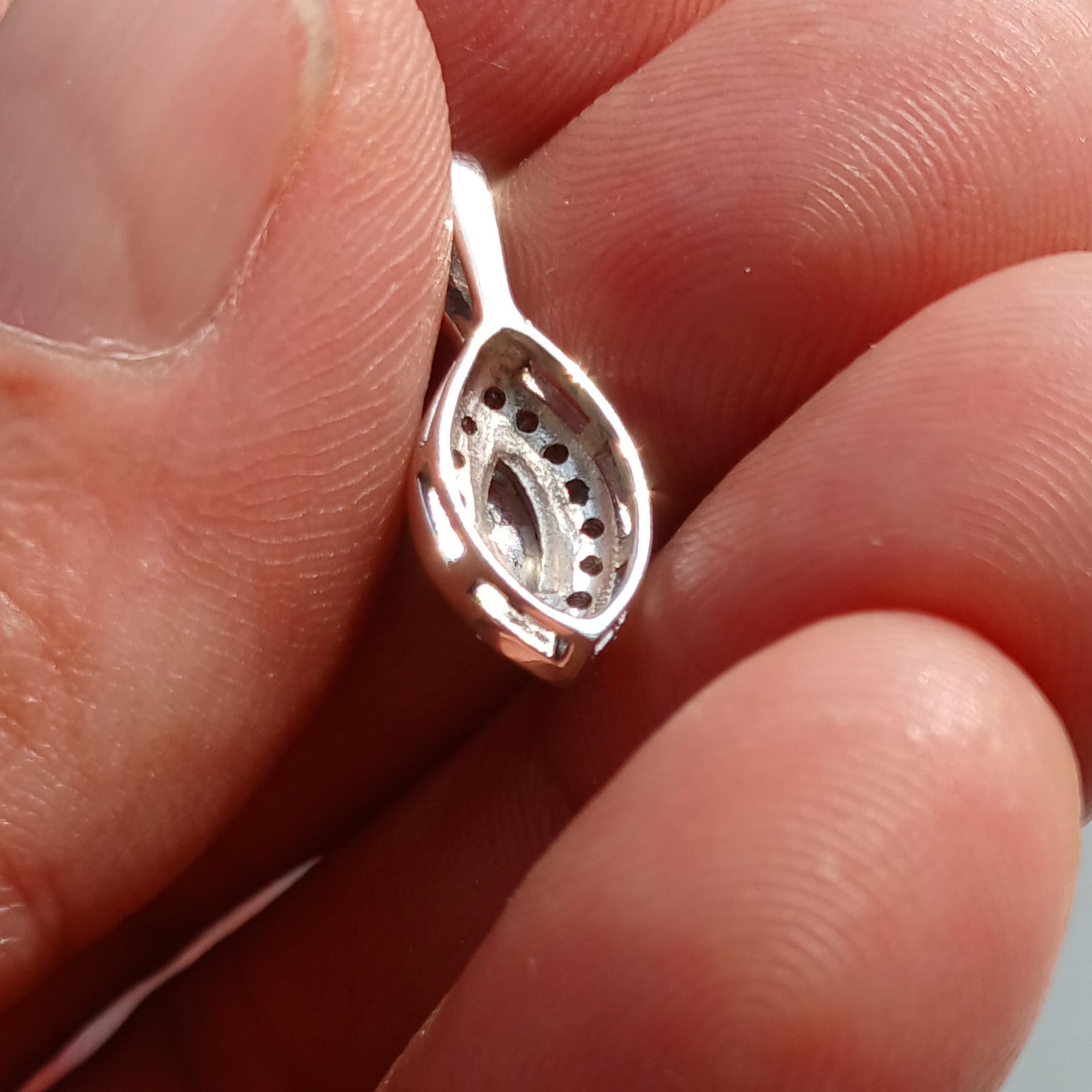 A beautiful Moonstone Pendant crafted in sterling silver, featuring a Ceylon Moonstone and sparkling CZ stones, showcasing elegance and charm.