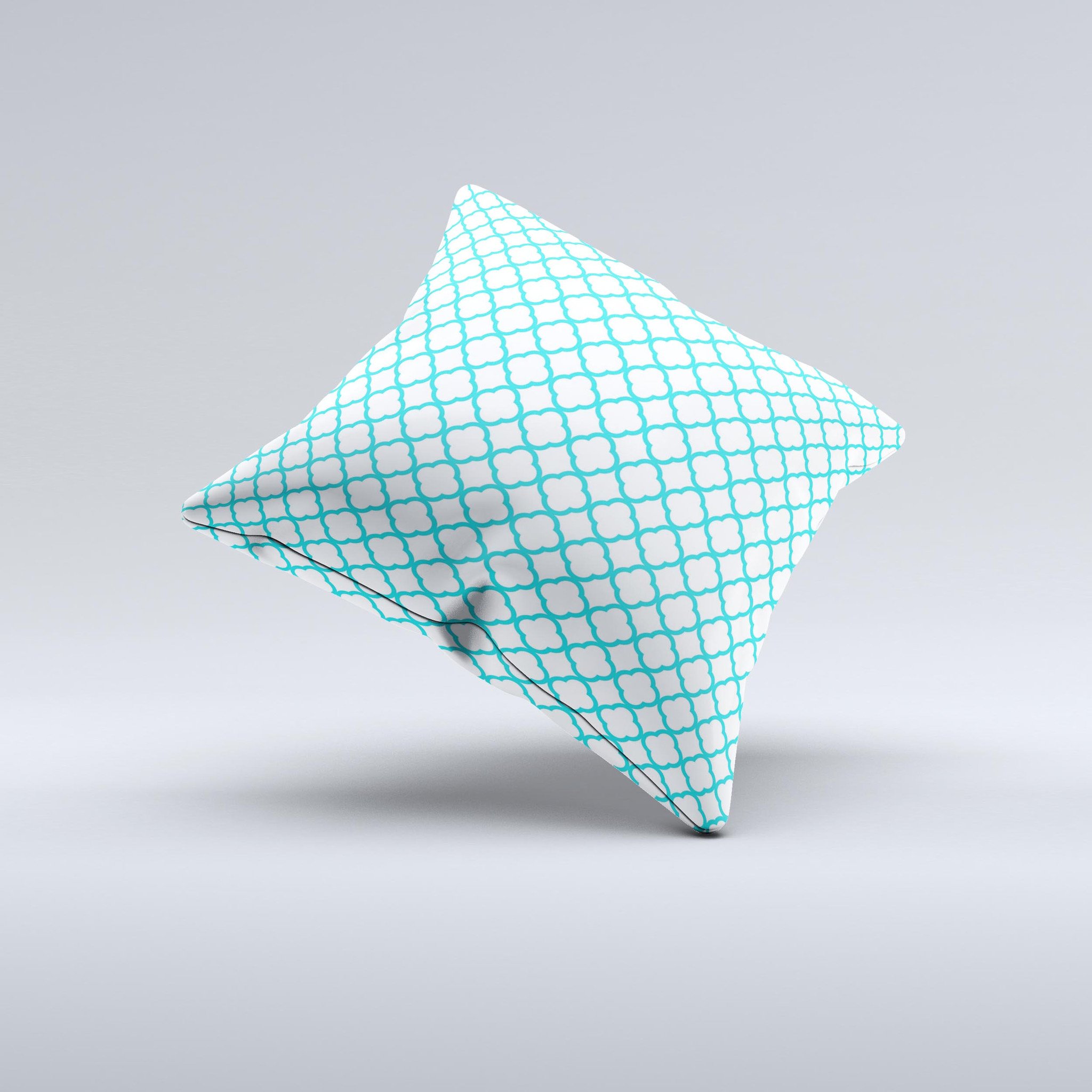 Moroccan teal decorative throw pillow with white ink design, handcrafted in Virginia, showcasing unique imperfections.