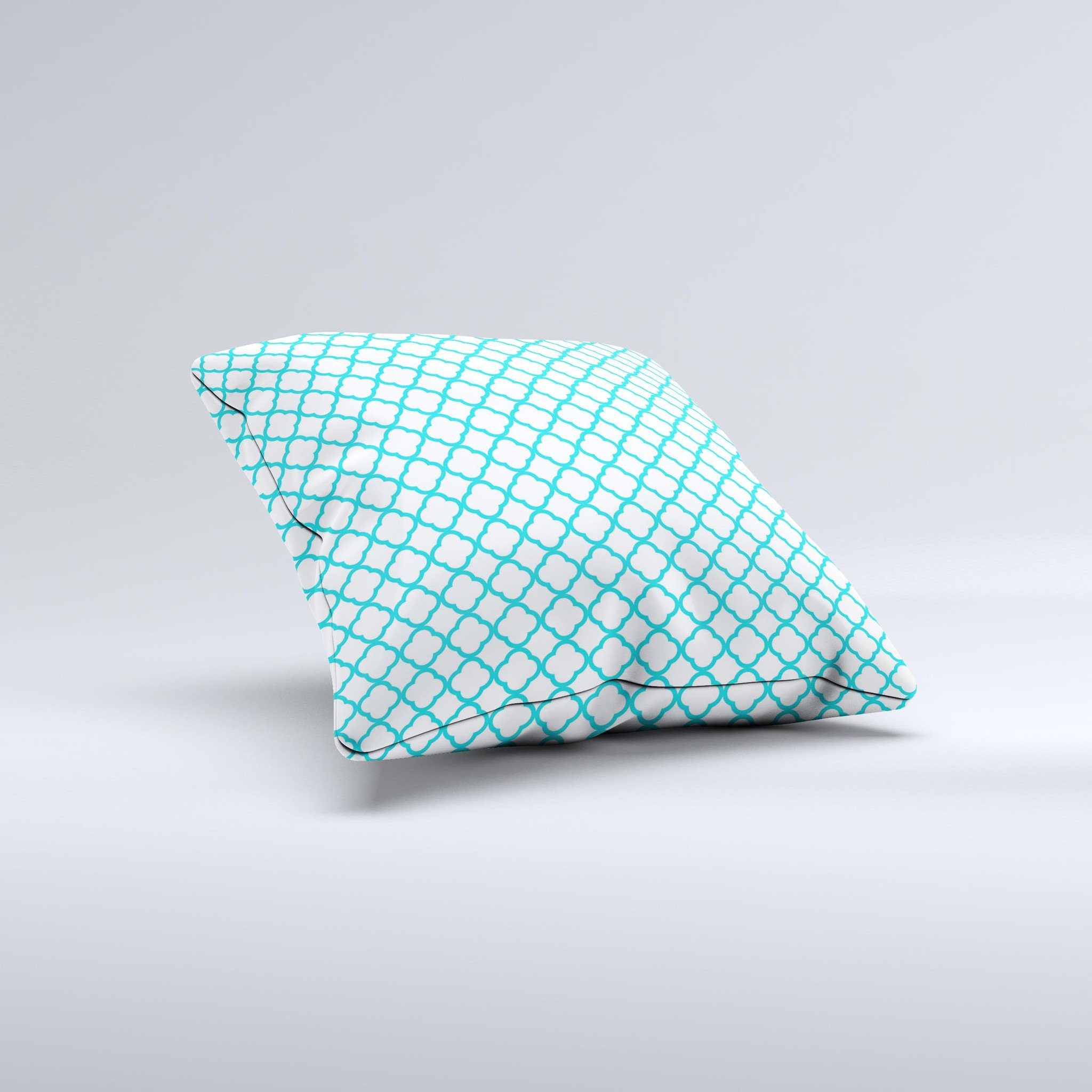 Moroccan teal decorative throw pillow with white ink design, handcrafted in Virginia, showcasing unique imperfections.