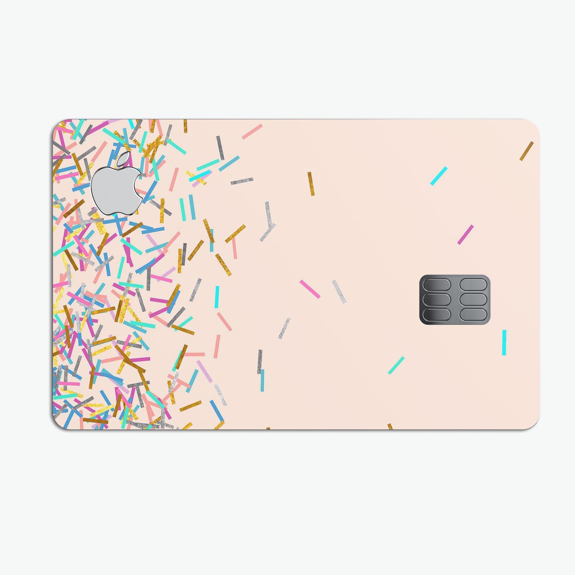 Multicolor Birth Sprinkles decal on a tan background, designed for Apple Card protection.