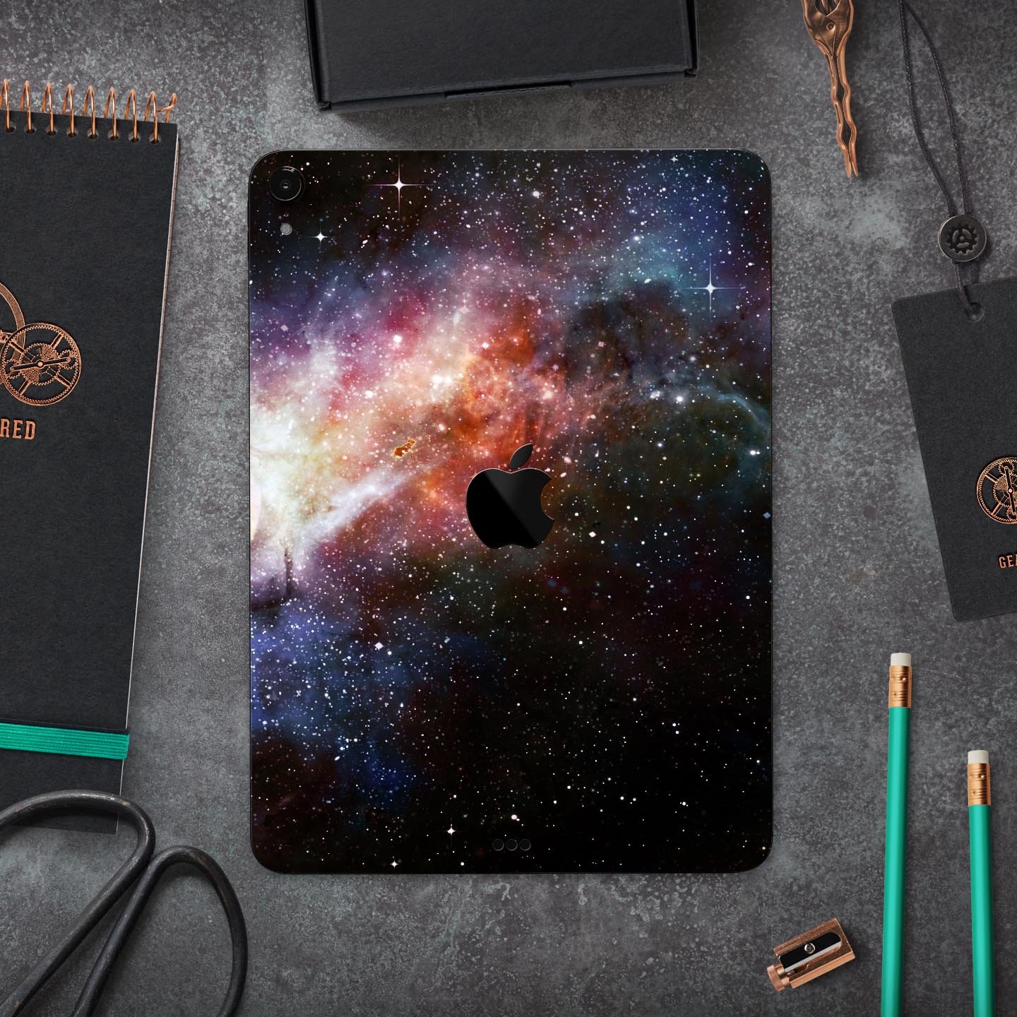 Multicolored Space Explosion skin decal for Apple iPad, showcasing vibrant colors and a sleek design.