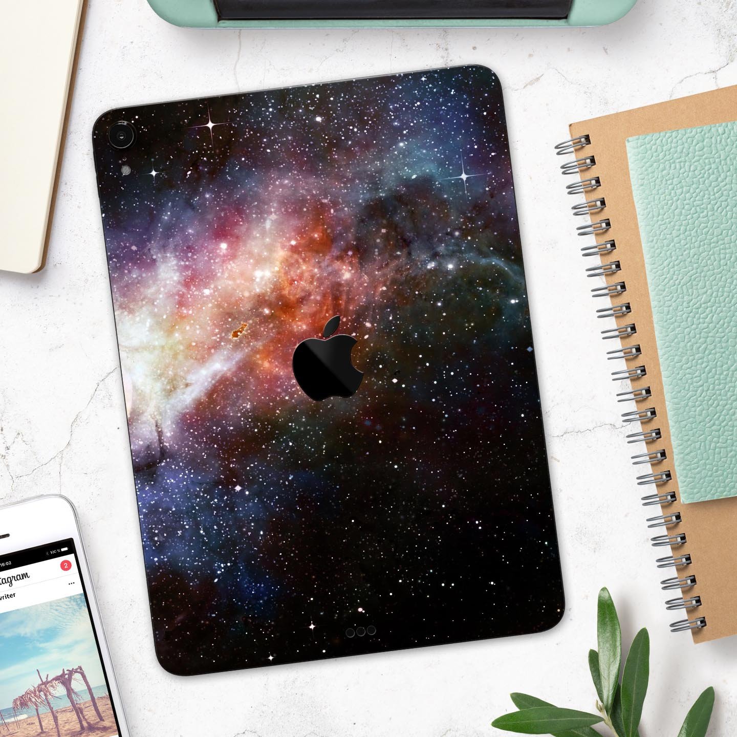 Multicolored Space Explosion skin decal for Apple iPad, showcasing vibrant colors and a sleek design.