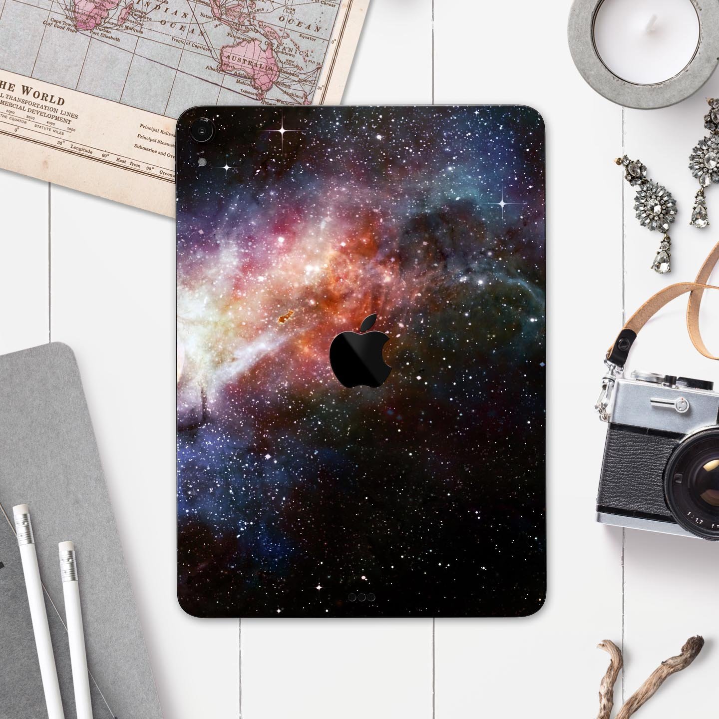 Multicolored Space Explosion skin decal for Apple iPad, showcasing vibrant colors and a sleek design.