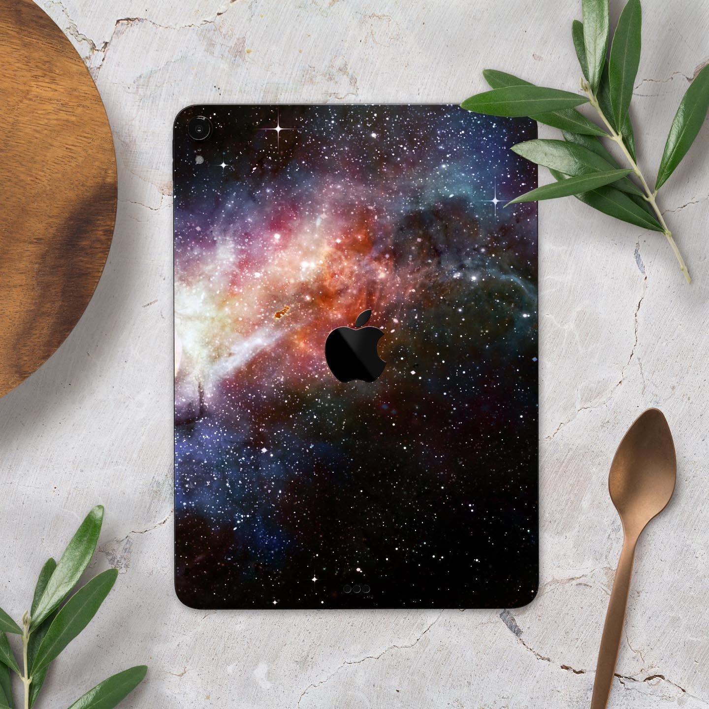 Multicolored Space Explosion skin decal for Apple iPad, showcasing vibrant colors and a sleek design.