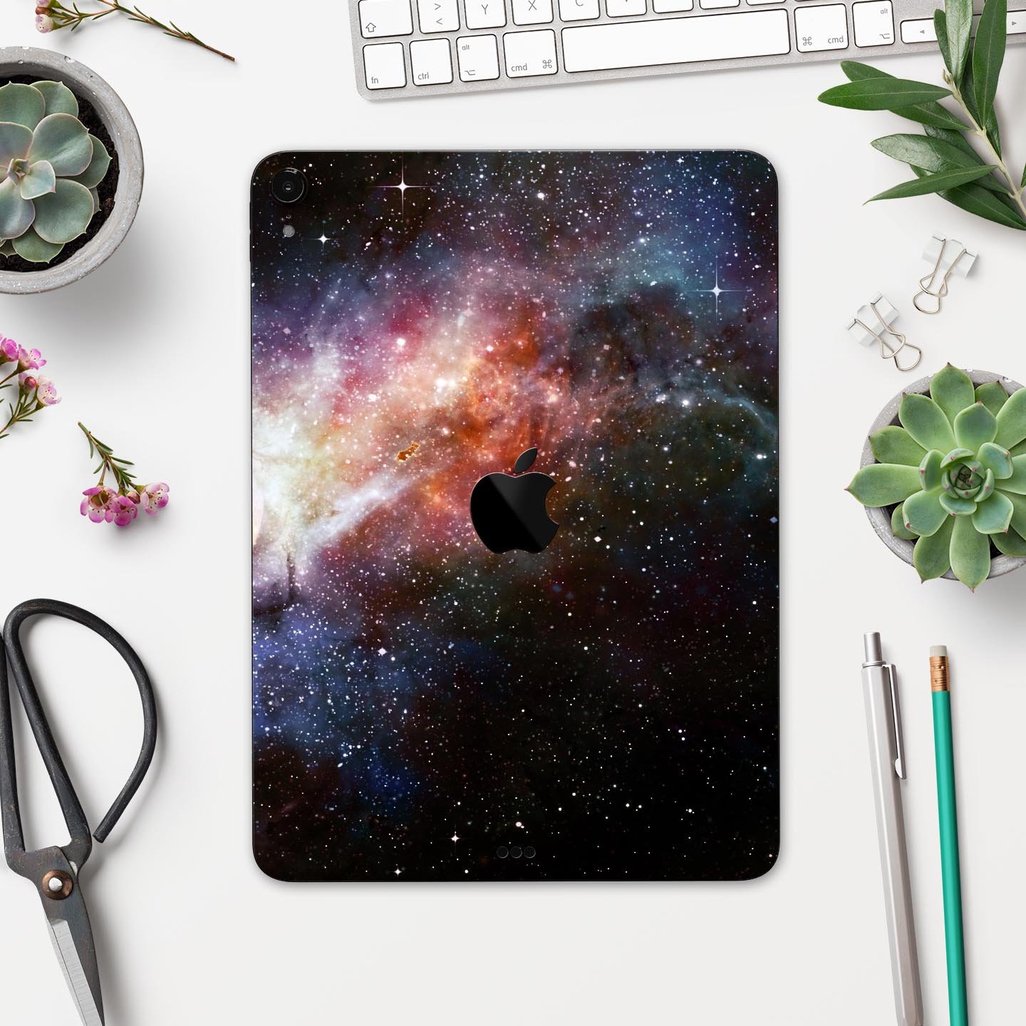 Multicolored Space Explosion skin decal for Apple iPad, showcasing vibrant colors and a sleek design.