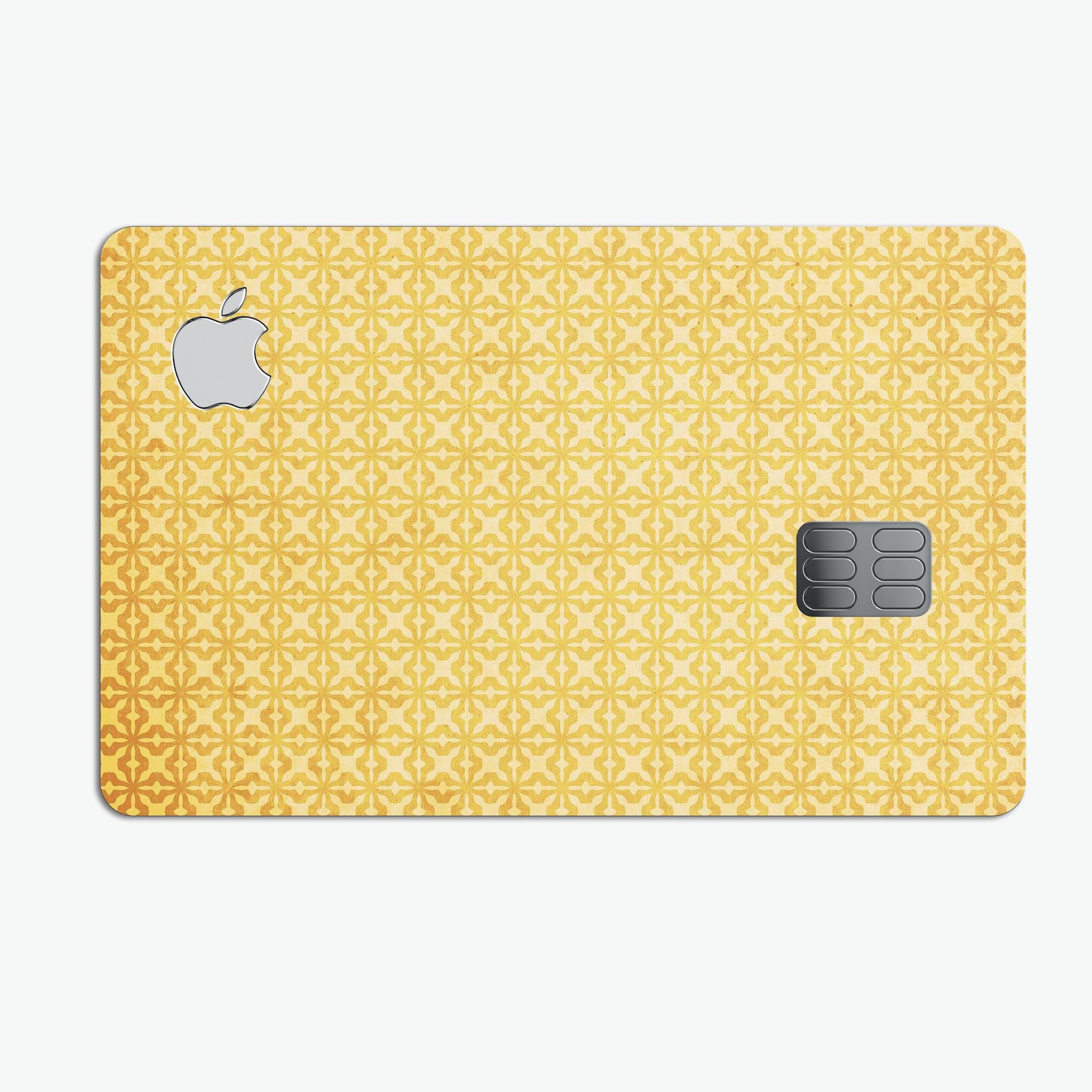 Mustard yellow decal skin with cross pattern designed for Apple Card, showcasing its vibrant color and protective features.