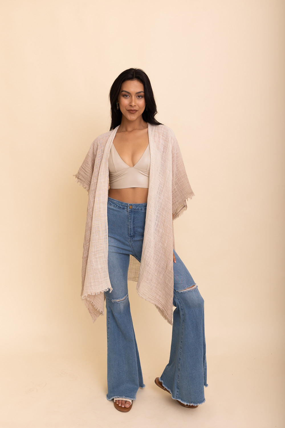 A lightweight cotton kimono in soothing blue and purple hues, featuring wide sleeves and a relaxed fit, perfect for casual wear.