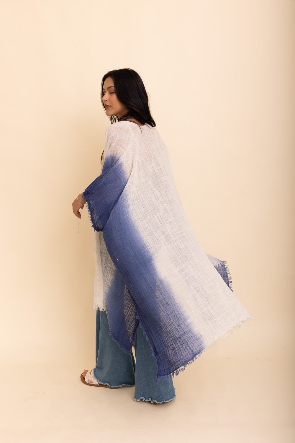 A lightweight cotton kimono in soothing blue and purple hues, featuring wide sleeves and a relaxed fit, perfect for casual wear.