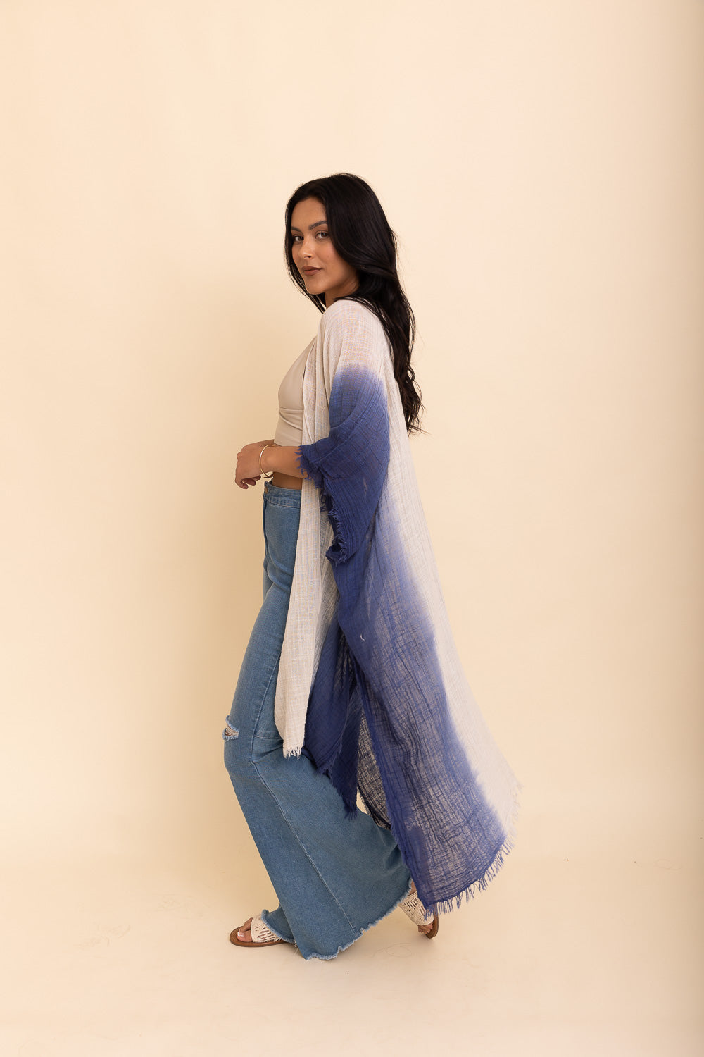 A lightweight cotton kimono in soothing blue and purple hues, featuring wide sleeves and a relaxed fit, perfect for casual wear.