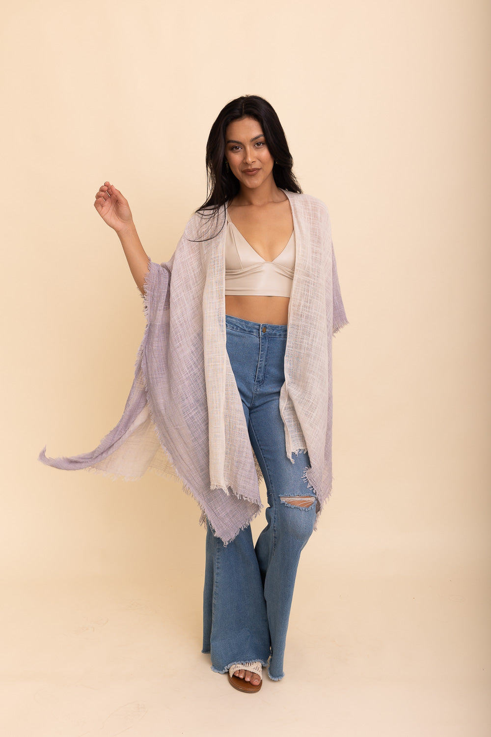 A lightweight cotton kimono in soothing blue and purple hues, featuring wide sleeves and a relaxed fit, perfect for casual wear.