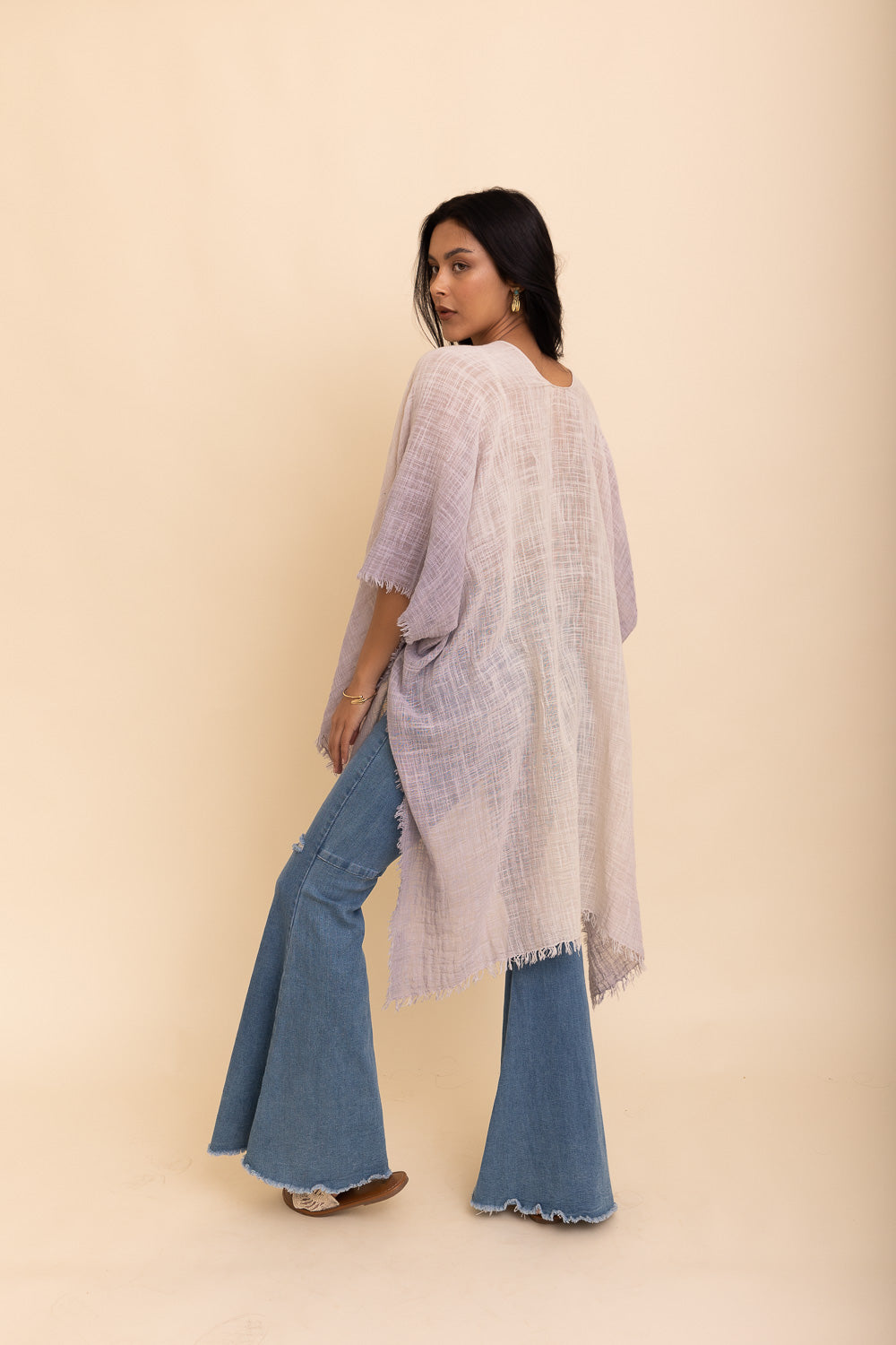 A lightweight cotton kimono in soothing blue and purple hues, featuring wide sleeves and a relaxed fit, perfect for casual wear.