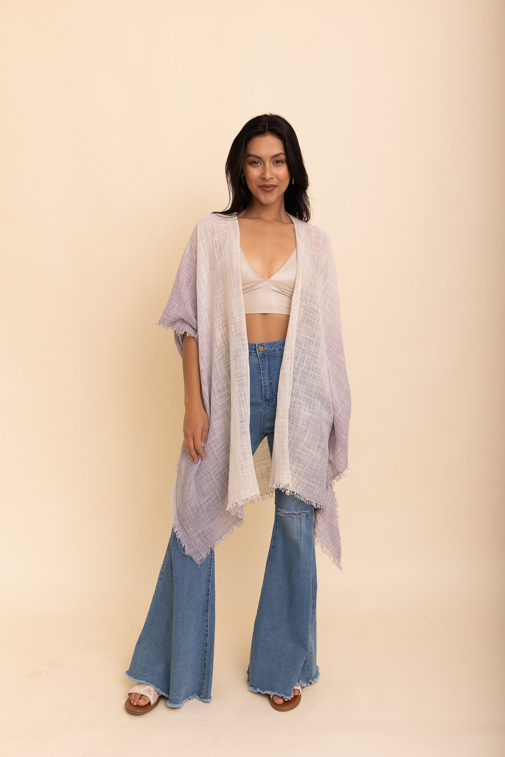 A lightweight cotton kimono in soothing blue and purple hues, featuring wide sleeves and a relaxed fit, perfect for casual wear.