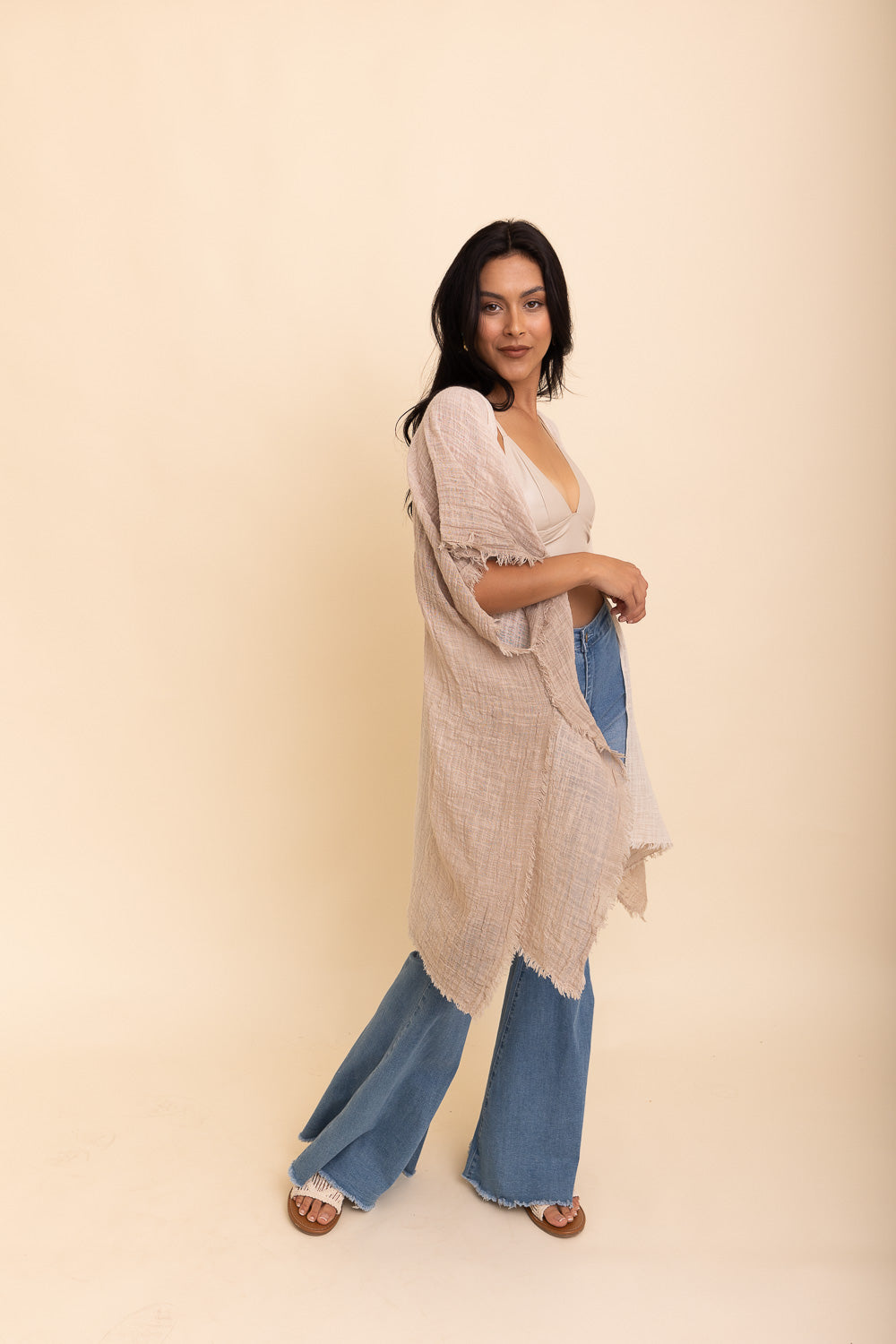 A lightweight cotton kimono in soothing blue and purple hues, featuring wide sleeves and a relaxed fit, perfect for casual wear.