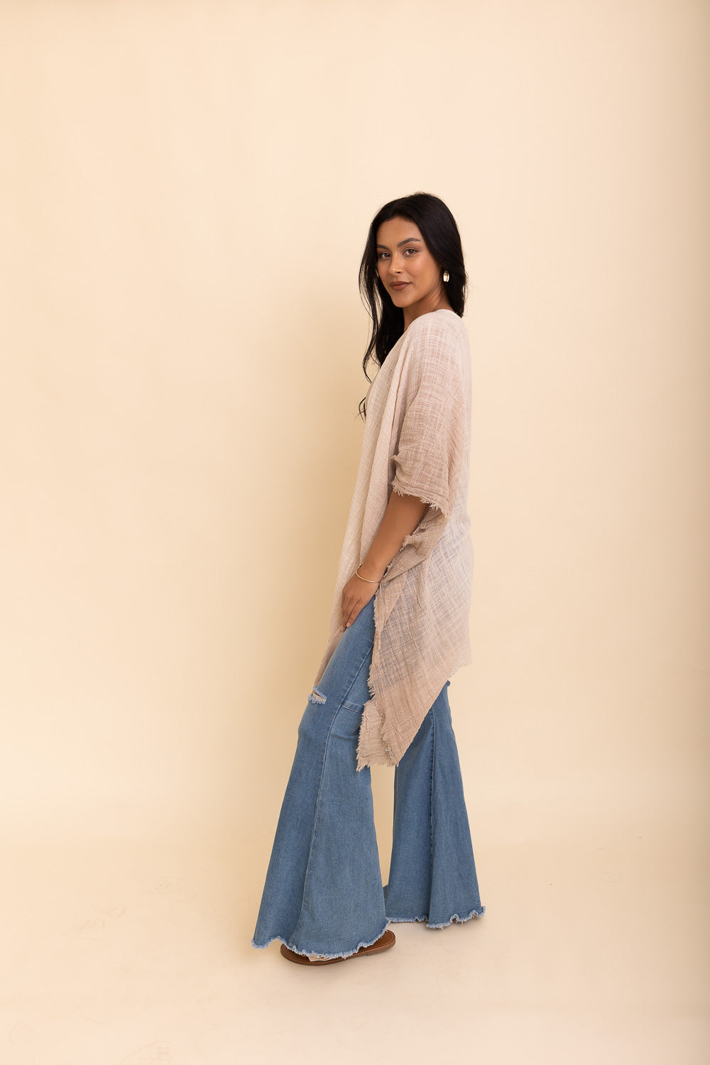 A lightweight cotton kimono in soothing blue and purple hues, featuring wide sleeves and a relaxed fit, perfect for casual wear.