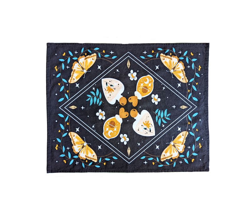 Mystic Nights Tea Towel featuring celestial designs, perfect for kitchen or altar use, made of 100% cotton.