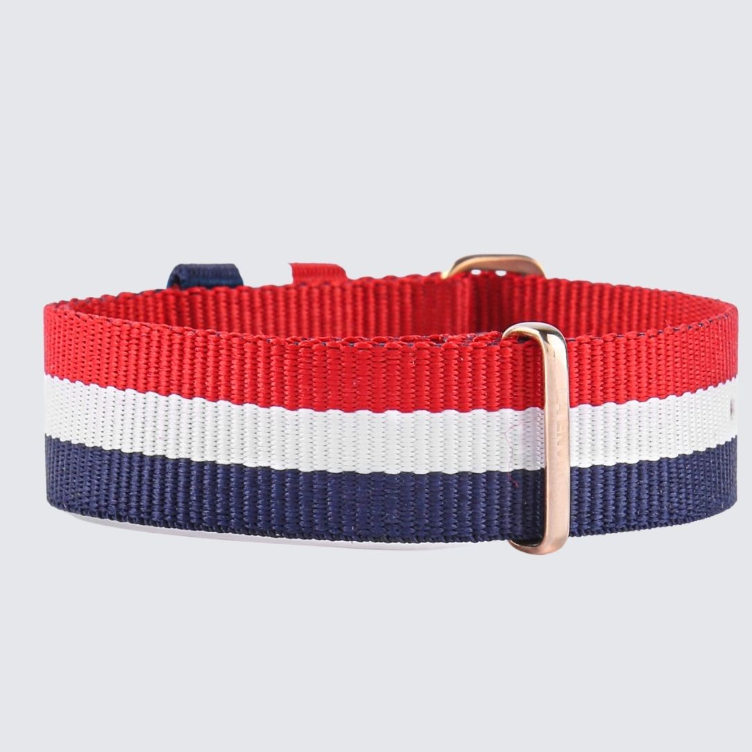 NATO Red, Blue & White Strap, 20mm width, featuring a black and rose gold stainless steel buckle, made from durable polyester fabric.