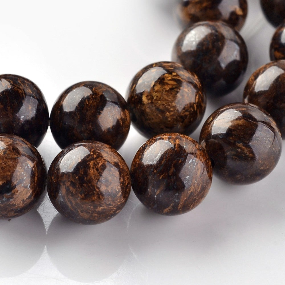 Natural bronzite round beads strands, 10mm diameter with 1mm hole, showcasing earthy tones and unique patterns.