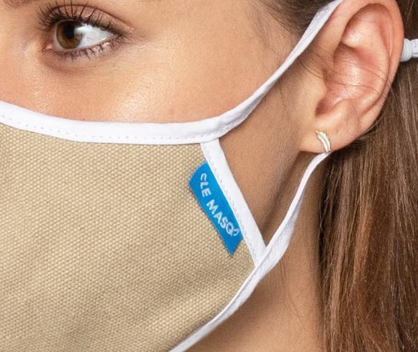 Natural Canvas Mask featuring a breathable design, adjustable ear toggles, and a removable inner layer for added comfort.