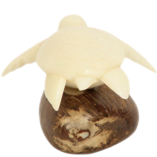 Hand-carved Natural Sea Turtle figurine made from tagua nuts, showcasing intricate details and natural colors.