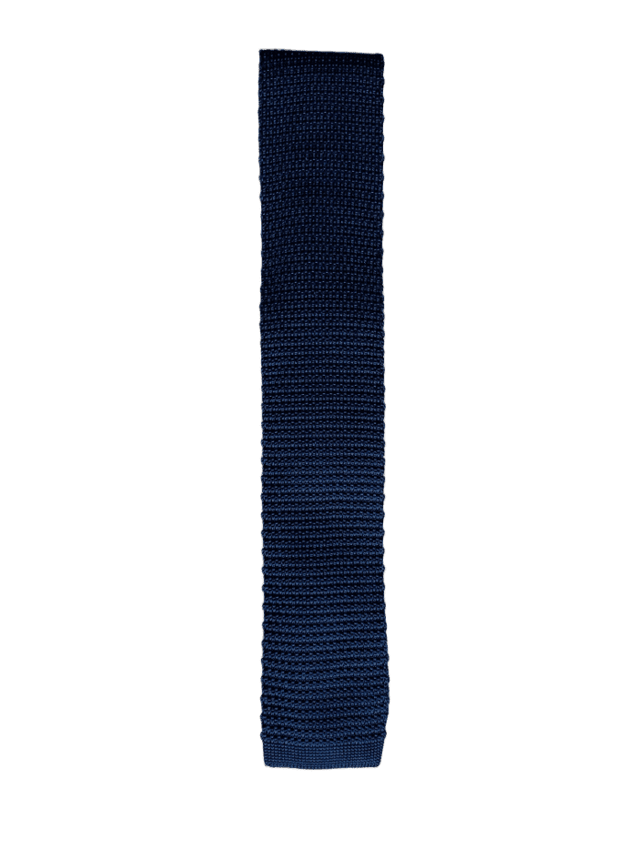 A luxurious navy blue knitted silk tie with a square end design, showcasing its rich color and texture.