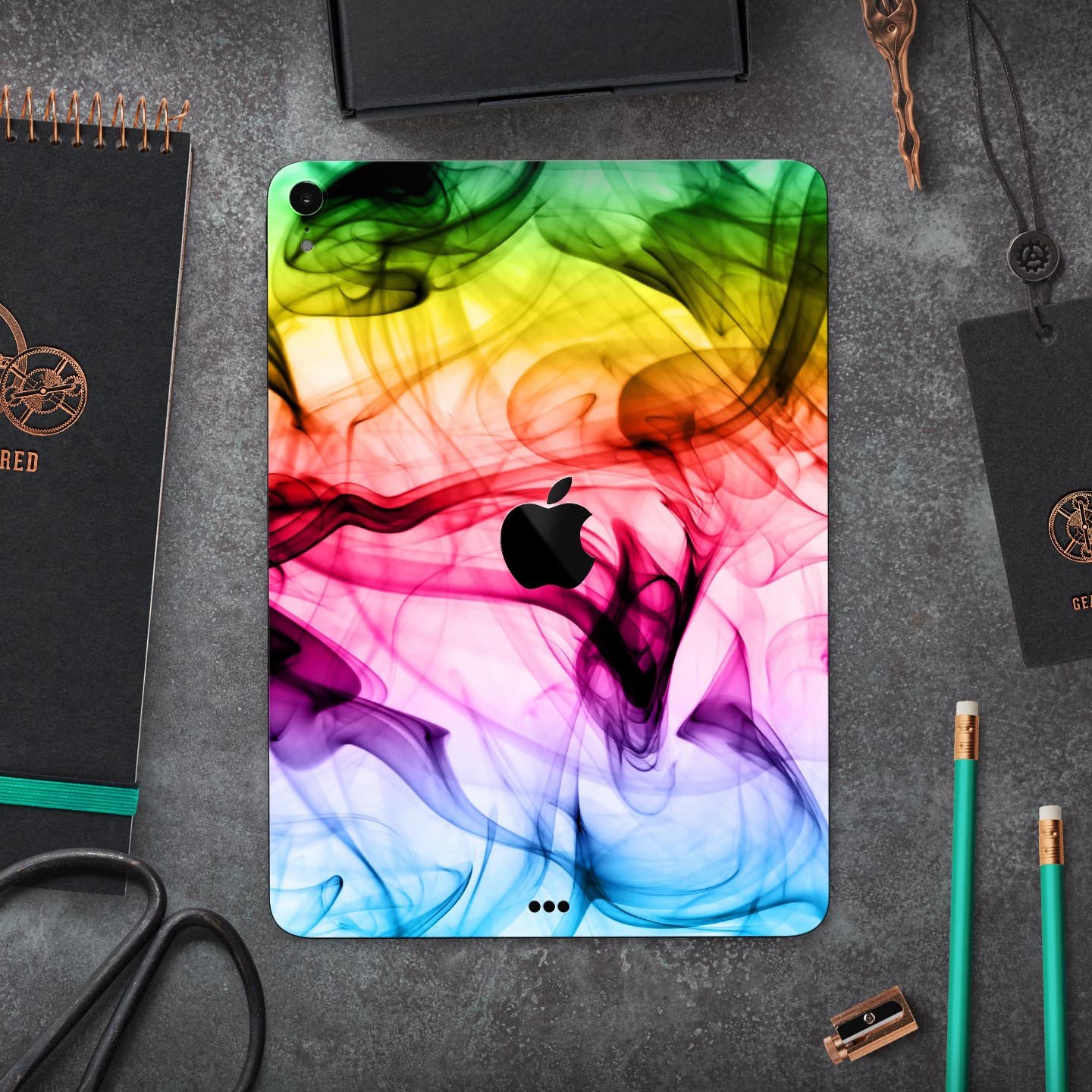 Neon Glowing Fumes skin decal for Apple iPad Pro, showcasing vibrant colors and a sleek design.