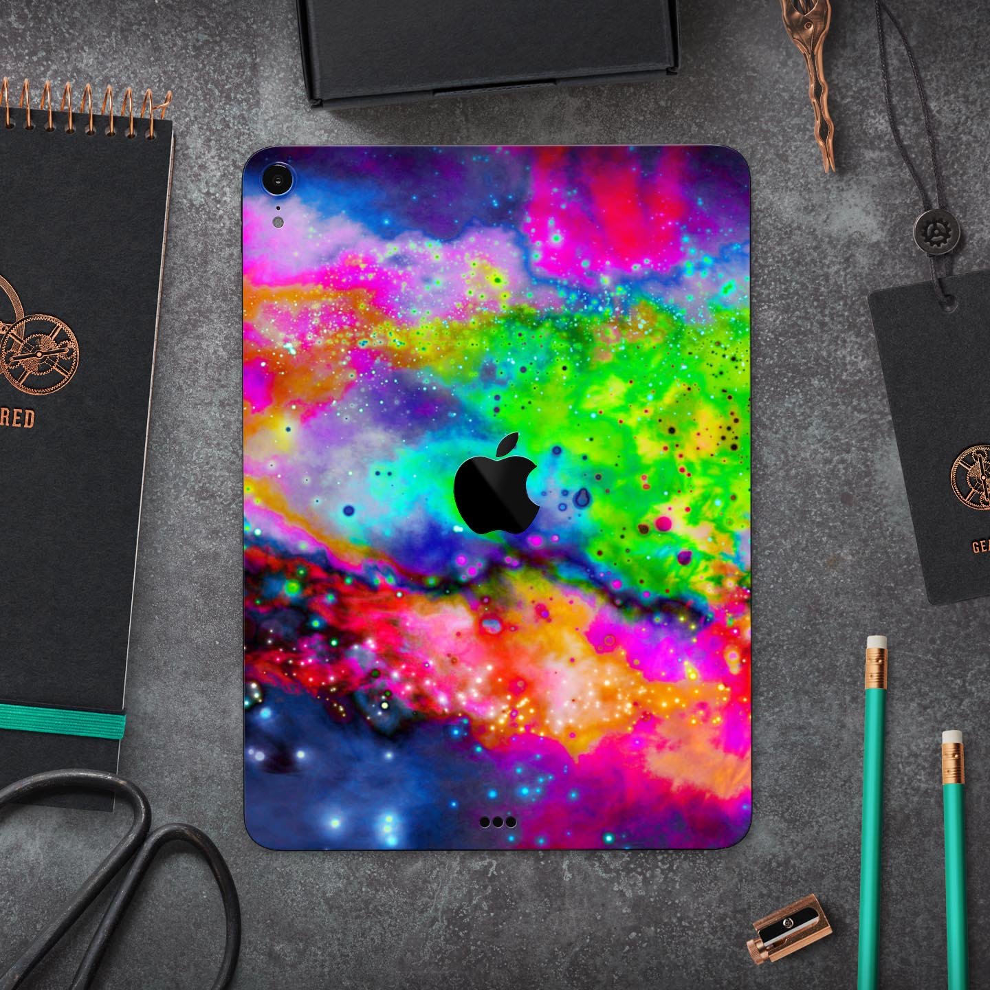 Neon Splatter Universe full body skin decal for Apple iPad Pro, showcasing vibrant colors and unique splatter design.