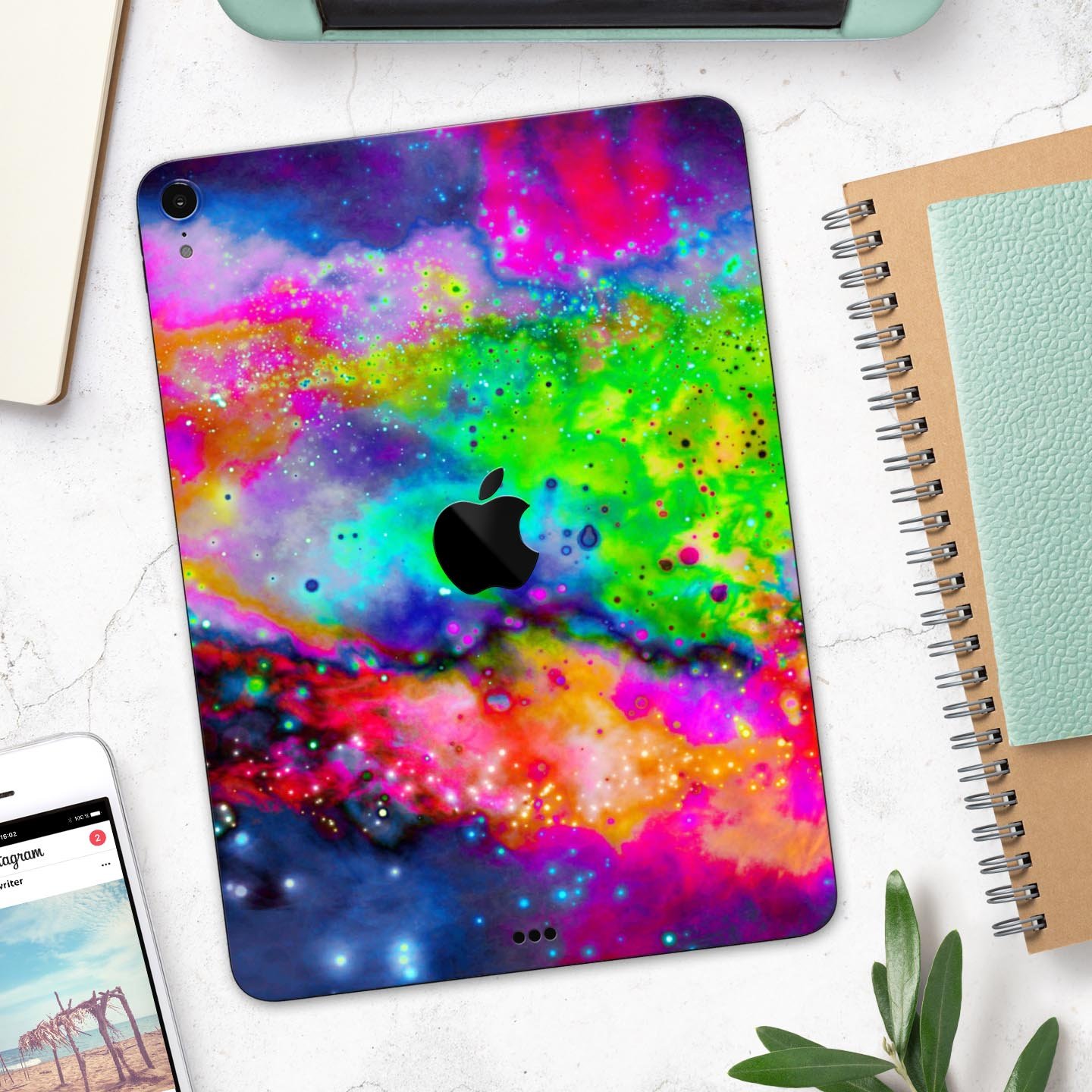 Neon Splatter Universe full body skin decal for Apple iPad Pro, showcasing vibrant colors and unique splatter design.