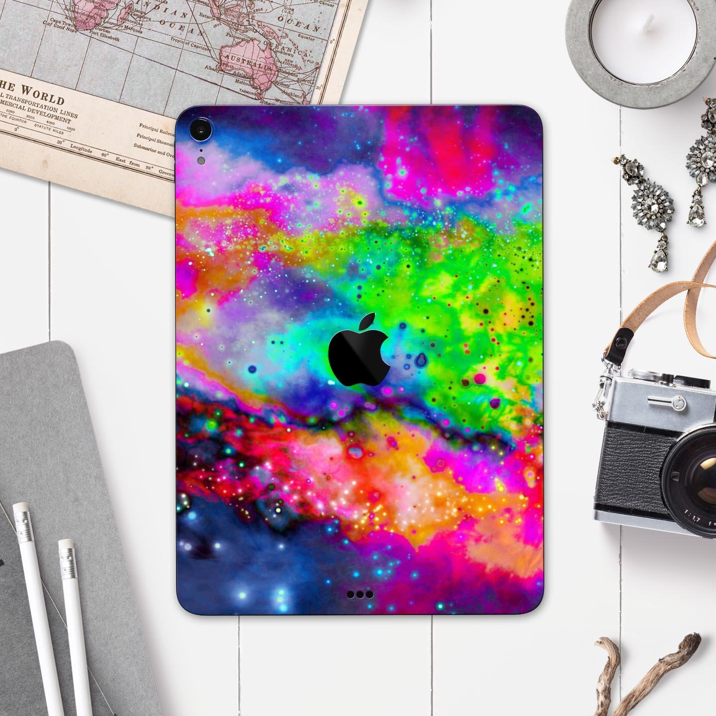 Neon Splatter Universe full body skin decal for Apple iPad Pro, showcasing vibrant colors and unique splatter design.