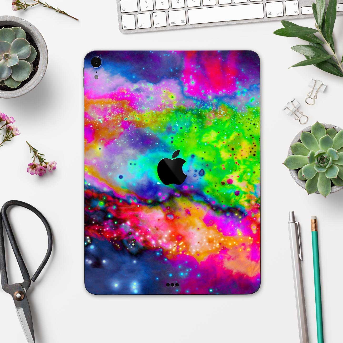 Neon Splatter Universe full body skin decal for Apple iPad Pro, showcasing vibrant colors and unique splatter design.