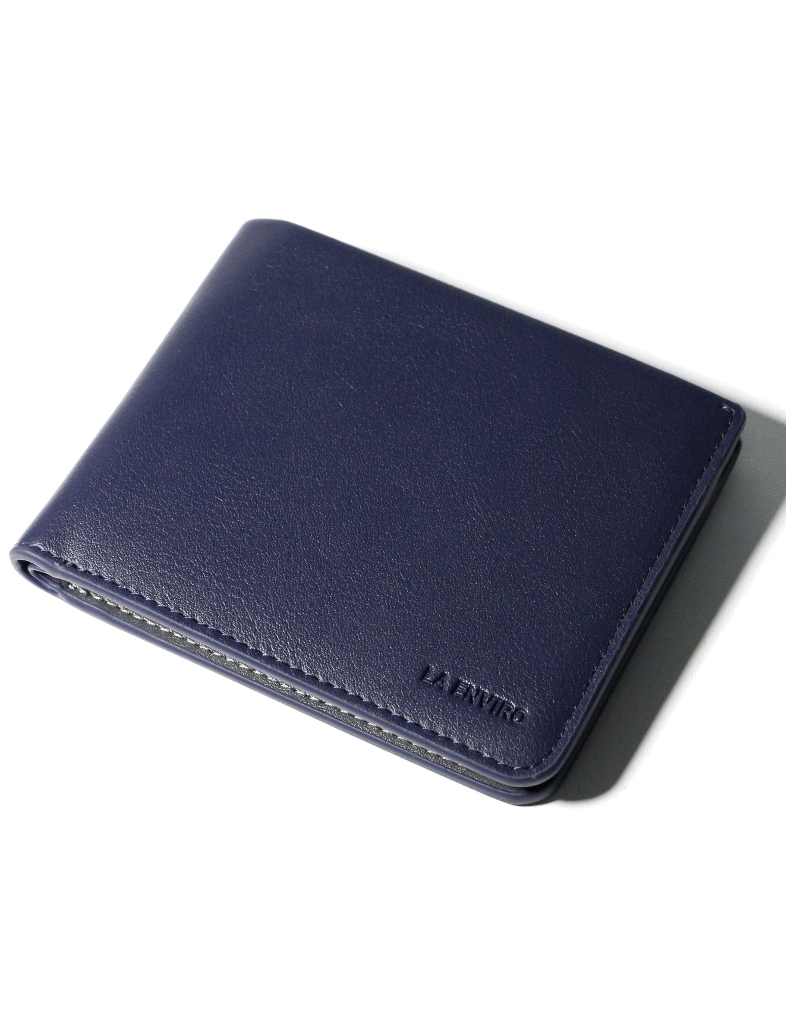 NEWTOWN Wallet in Blue, made from premium vegan leather, featuring card slots, coin pouch, and ID window.