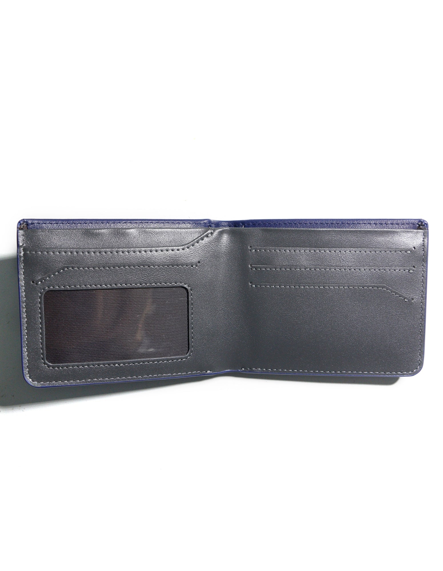 NEWTOWN Wallet in Blue, made from premium vegan leather, featuring card slots, coin pouch, and ID window.