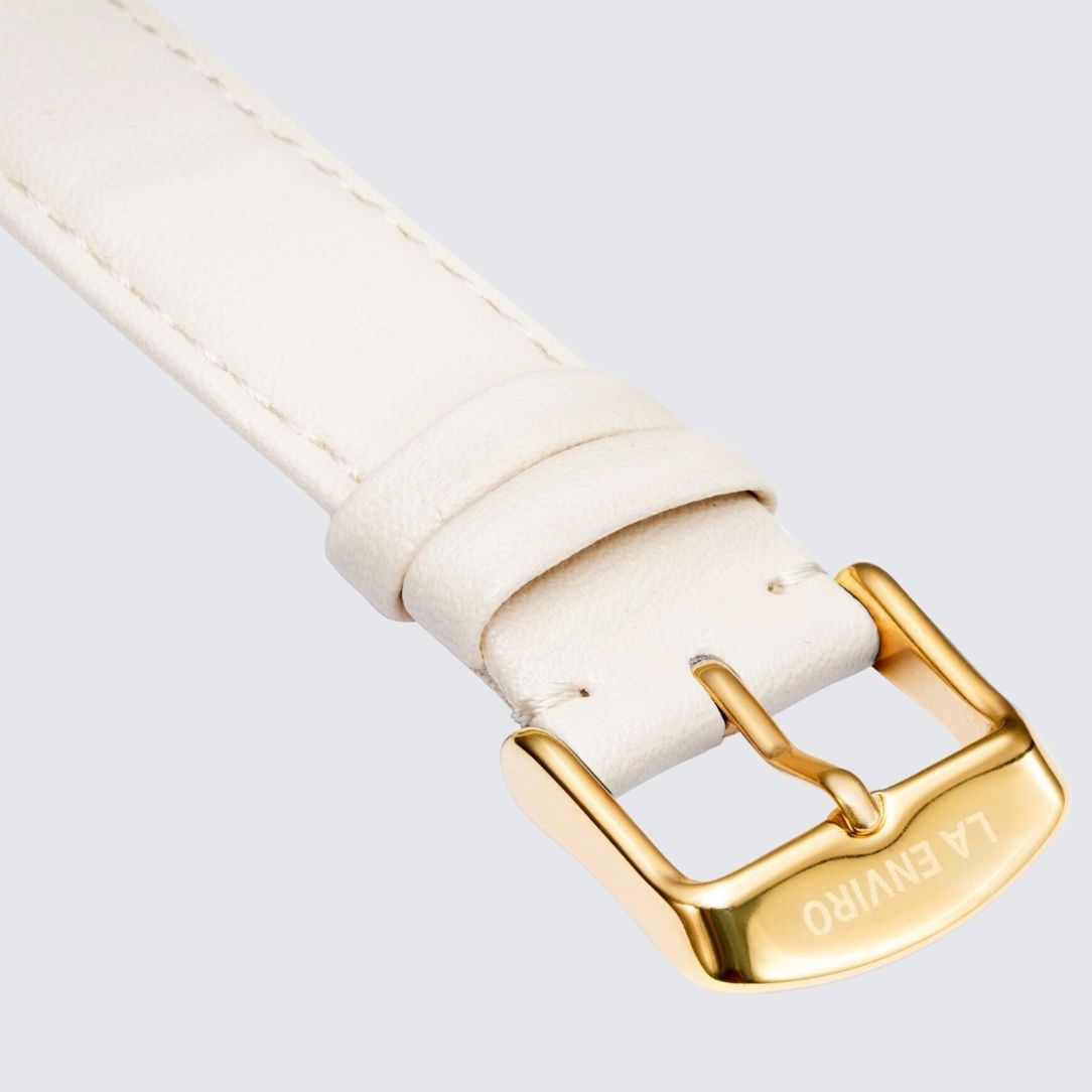 Nude Vegan Leather Watch Strap with stainless steel buckle in rose gold, showcasing its soft texture and quick release pins.